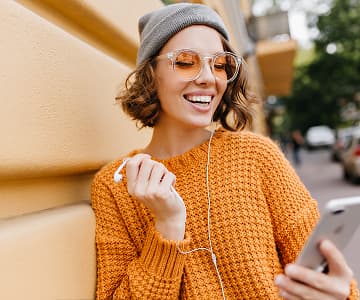 Girl in headphones with phone